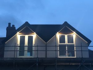 Birmingham loft conversion with balcony at night