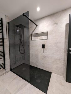 shower installation in loft conversion bathroom