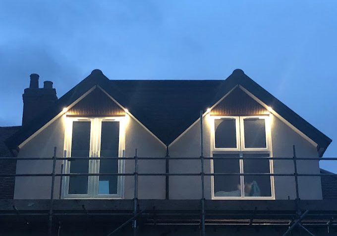 Sedgley loft conversion with balcony at night